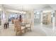Dining area with mirrored walls, chandelier and an open floor plan at 1 Key Capri # 302E, Treasure Island, FL 33706