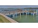 Enjoy easy access to the water from the private community dock at 1 Key Capri # 302E, Treasure Island, FL 33706