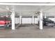 The garage is well lit and has assigned parking spaces and storage at 1 Key Capri # 302E, Treasure Island, FL 33706