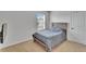 Spare bedroom featuring neutral tones and a window providing natural light at 11019 Leland Groves Dr, Riverview, FL 33579
