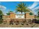 Elegant brick signage for Southfork Lakes community, showcasing landscaping and a welcoming entrance at 11019 Leland Groves Dr, Riverview, FL 33579