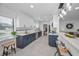 Modern kitchen with sleek countertops, stainless appliances, and easy access to the adjacent living spaces at 112 Peterson Ln, Palm Harbor, FL 34683