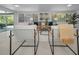 Bright living room boasting neutral decor, modern seating, and large windows, creating an inviting space at 112 Peterson Ln, Palm Harbor, FL 34683