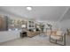Comfortable living room with neutral-toned furnishings, decorative pillows, and large windows for natural light at 112 Peterson Ln, Palm Harbor, FL 34683