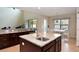 Beautiful kitchen with granite countertops and stainless steel appliances at 11408 Scribner Station Ln, Lithia, FL 33547