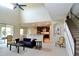 Open floorplan with living room that flows into the kitchen and staircase to the second story at 11408 Scribner Station Ln, Lithia, FL 33547