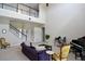Bright living room with high ceilings and a view of the second floor at 11408 Scribner Station Ln, Lithia, FL 33547