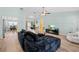 Bright open living space with a dining area, an entertainment area, and access to the kitchen at 12546 Brookside St, Spring Hill, FL 34609