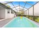 Spacious in-ground pool with patterned patio perfect for entertaining and enjoying the outdoors at 12546 Brookside St, Spring Hill, FL 34609
