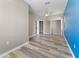 Bedroom with closet and wood-look floors at 1291 Blackrush Dr, Tarpon Springs, FL 34689