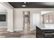 Neutral hallway with wood-look flooring leading to various rooms in the home at 1291 Blackrush Dr, Tarpon Springs, FL 34689
