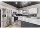 Modern kitchen featuring stainless appliances and ample cabinet space at 1291 Blackrush Dr, Tarpon Springs, FL 34689