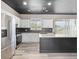 Modern kitchen with stainless steel appliances and an island at 1291 Blackrush Dr, Tarpon Springs, FL 34689