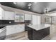 Beautiful kitchen with white cabinets and island with a white countertop at 1291 Blackrush Dr, Tarpon Springs, FL 34689