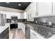 Bright, modern kitchen featuring stainless appliances and stylish backsplash at 1291 Blackrush Dr, Tarpon Springs, FL 34689