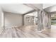 Spacious living room featuring beautiful floors and natural light at 1291 Blackrush Dr, Tarpon Springs, FL 34689