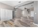 Bright living room with modern flooring, neutral paint, and built in storage at 1291 Blackrush Dr, Tarpon Springs, FL 34689