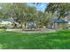 Neighborhood playground featuring a gazebo with benches and playground equipment, perfect for gatherings and Gathering time at 1291 Blackrush Dr, Tarpon Springs, FL 34689