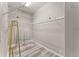 Spacious walk-in closet with modern flooring and plenty of storage space at 1291 Blackrush Dr, Tarpon Springs, FL 34689