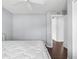 Bedroom with wood floors and white walls at 13384 Brighton St, Spring Hill, FL 34609