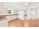 Well-lit kitchen featuring modern appliances, ample cabinet space, and functional layout at 13384 Brighton St, Spring Hill, FL 34609