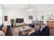 Comfortable living room with stylish furniture, a large TV, and modern decor at 13384 Brighton St, Spring Hill, FL 34609