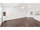 Spacious living room features ceiling fans, modern lighting, and hardwood flooring at 13384 Brighton St, Spring Hill, FL 34609