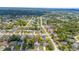 Neighborhood with mature trees and manicured lawns at 14006 Amero Ln, Spring Hill, FL 34609