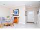 Bright dining area adjacent to the entry foyer at 1674 Roseville St, Lutz, FL 33549
