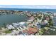 Coastal community near the ocean has waterfront homes with pools, docks, and manicured lawns at 17025 Dolphin Dr, North Redington Beach, FL 33708