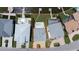 Aerial view of the property with an outlined lot, showcasing the backyard, pool, and surroundings at 17025 Dolphin Dr, North Redington Beach, FL 33708