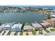 Aerial view of waterfront homes with private docks in a desirable neighborhood at 17025 Dolphin Dr, North Redington Beach, FL 33708