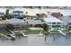 Waterfront homes feature docks, pools, and lush landscaping in this desirable coastal community at 17025 Dolphin Dr, North Redington Beach, FL 33708