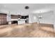 Expansive floor plan view of the kitchen and living room with plenty of room to gather and entertain at 1830 Cameron Ct, Trinity, FL 34655