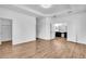 A spacious main bedroom features wood floors, tray ceiling, and an ensuite bath at 1830 Cameron Ct, Trinity, FL 34655