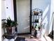 Condo entryway with plants, decor, and plenty of sunlight at 1865 Mazo Manor # 1, Lutz, FL 33558