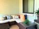 Patio area with plenty of seating and cushions for comfort at 1865 Mazo Manor # 1, Lutz, FL 33558