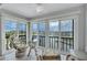 Enjoy the water views from this cozy balcony seating area at 19029 Us Highway 19 N # 8-31, Clearwater, FL 33764