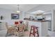Bright kitchen area with bar seating and stainless steel appliances at 19029 Us Highway 19 N # 8-31, Clearwater, FL 33764