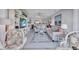 Comfortable living room with open floor plan, bright lighting, and cozy seating area at 19029 Us Highway 19 N # 8-31, Clearwater, FL 33764