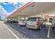 Assigned covered parking spots with red roof tile to match the building exterior design at 19029 Us Highway 19 N # 8-31, Clearwater, FL 33764