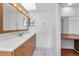 Bathroom featuring a white countertop sink with wood drawers and a built-in vanity space at 2559 Redwood Cir, Clearwater, FL 33763