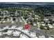 Aerial view of a villa community with mature trees and well-maintained landscaping at 2814 Highlands Blvd # B, Palm Harbor, FL 34684