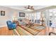 Cozy living room with comfortable seating, natural light, and an open layout for easy entertaining at 2814 Highlands Blvd # B, Palm Harbor, FL 34684