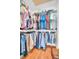 Well-organized walk-in closet featuring rods and shelving for ample storage at 2814 Highlands Blvd # B, Palm Harbor, FL 34684