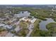 Aerial view of condo complex near a river with a city skyline in the background at 2900 45Th S St # 26, Gulfport, FL 33711