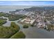 Aerial view of waterfront condo with a pool and nearby marina at 2900 45Th S St # 26, Gulfport, FL 33711