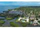 Stunning aerial view of waterfront community with a marina, beautiful landscaping, and pool at 2900 45Th S St # 26, Gulfport, FL 33711