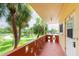 Outdoor balcony space with colorful design and tropical scenery at 2900 45Th S St # 26, Gulfport, FL 33711