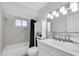 Clean bathroom featuring a shower-tub combo and contemporary fixtures at 2900 45Th S St # 26, Gulfport, FL 33711